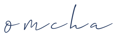 The omcha logo, the word omcha written in thin black script font